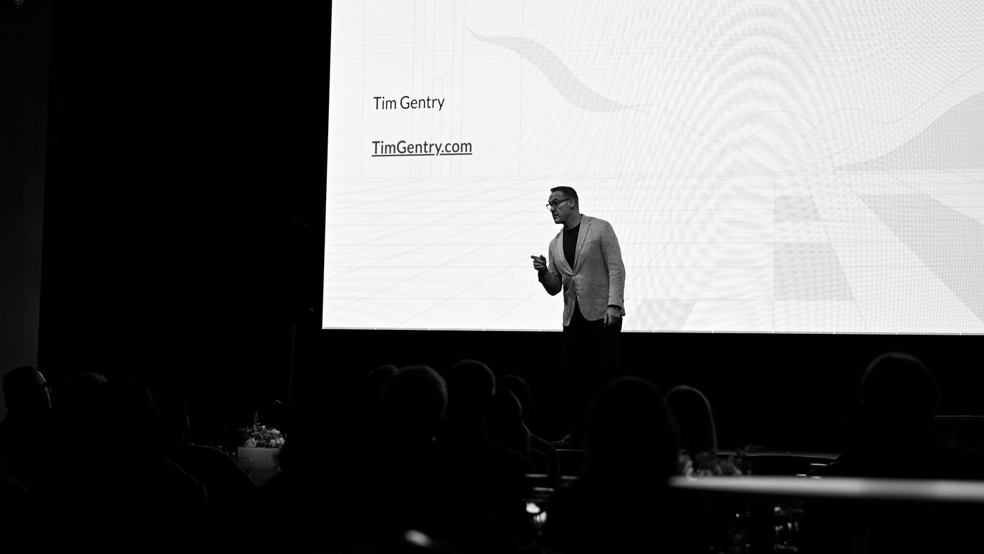 Dr. Timothy H. Gentry (Tim Gentry) delivering 'Go Teach It': a keynote on reducing time to correction through repeatable AI adoption, member-organization audience, 2026